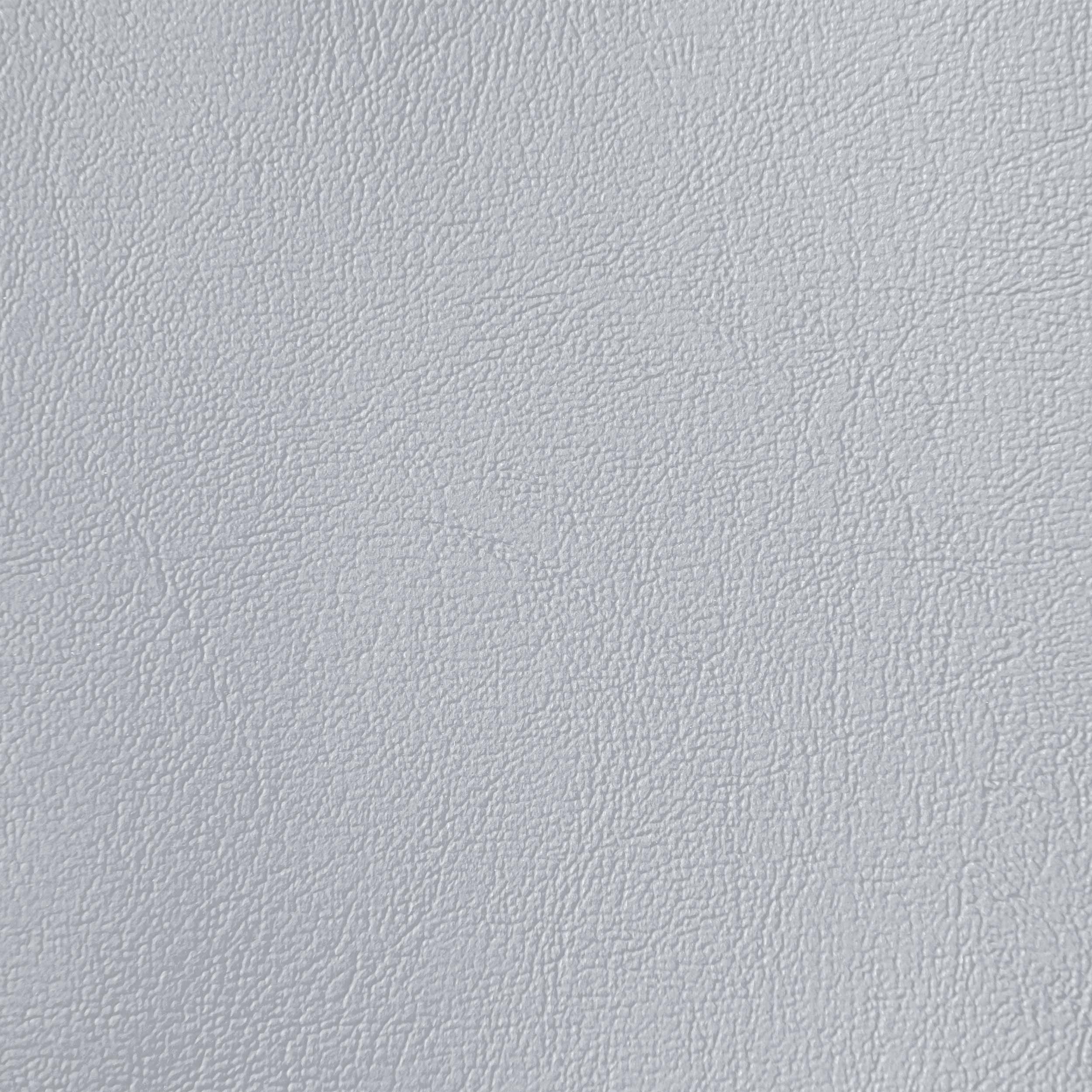 Ljusgrått konstläder närbild